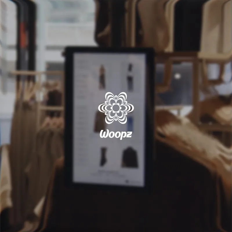 Woopz kiosk screen in a fashion store